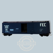 Load image into Gallery viewer, MTL - Micro Trains - 33080 - 50 Foot Standard Box Car - with Plug Door and Sliding Door - Florida East Coast Livery - 5002 - N Gauge
