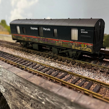 Load image into Gallery viewer, Hornby R6919 BR 4-WHEEL CCT Van - Express Parcels - (With Graffiti) - OO Gauge
