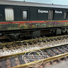 Load image into Gallery viewer, Hornby - R6919 - BR MK1 - 4 Wheel CCT Covered Carriage Truck - With Graffiti - BR Express Parcels Blue Livery - M94220 - OO Gauge
